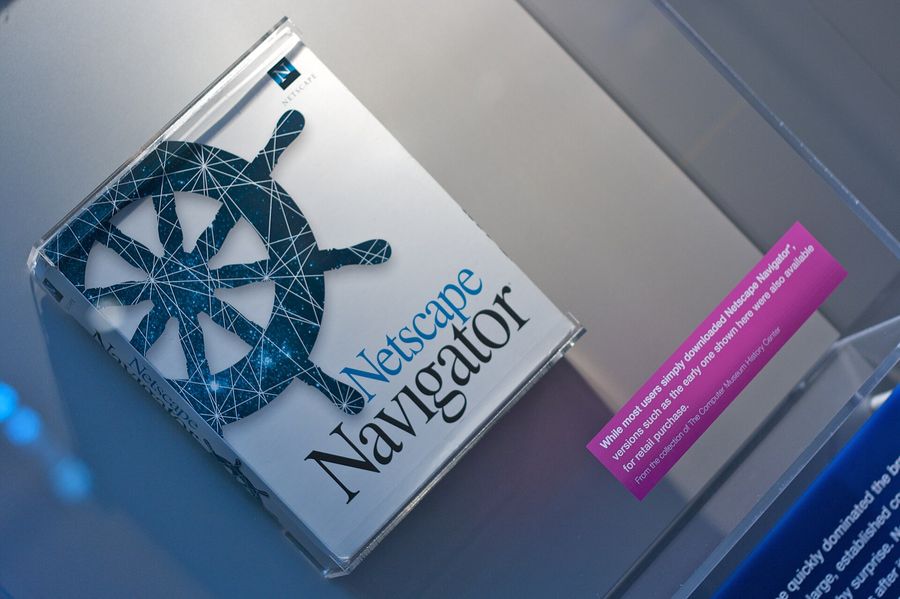 A boxed copy of Netscape Navigator, with its ship's-wheel logo, in a display case at the Computer History Museum