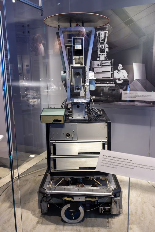 Shakey the robot: a tall wheeled cart carrying a camera and range-finder, on display at the Computer History Museum