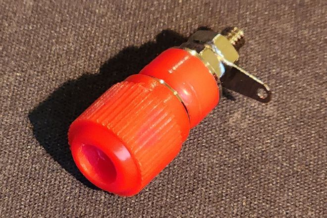 A red binding post