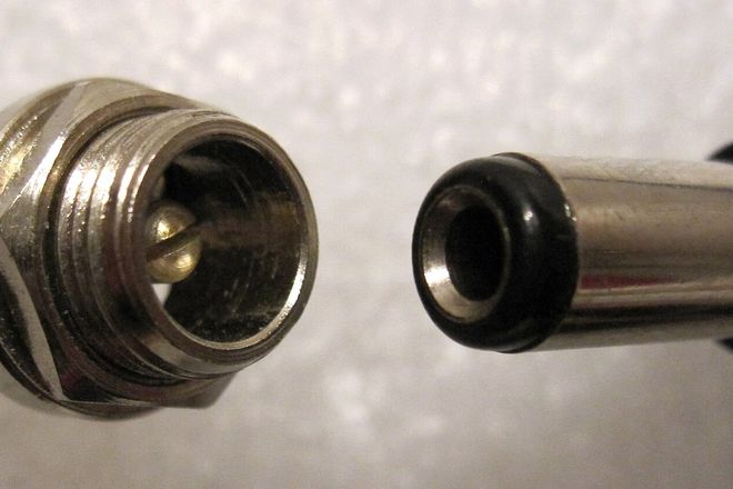 A 5.5 by 2.5 mm DC barrel socket and plug