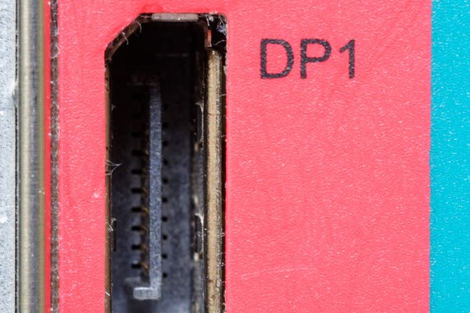 A DisplayPort socket on a computer, with one cut-off corner