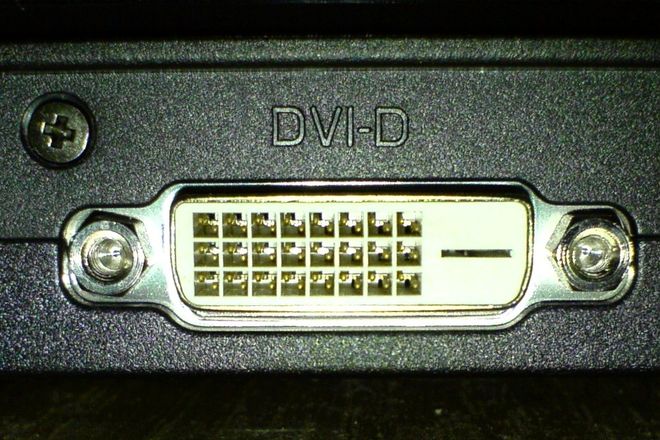 A DVI-D port on a monitor, with a plain blade slot