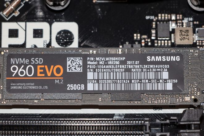 An M.2 solid-state drive fitted in the slot on a motherboard