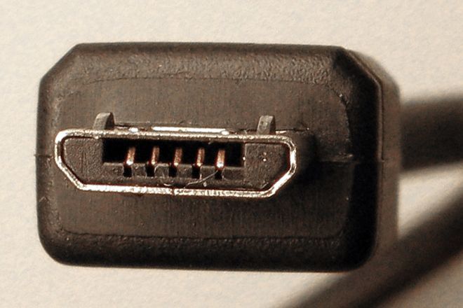 A USB Micro-B plug seen end-on, showing its five contacts