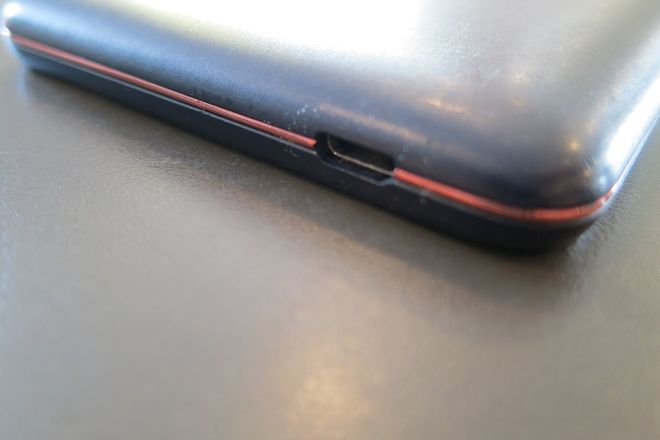 A USB Micro-B port on the edge of a phone