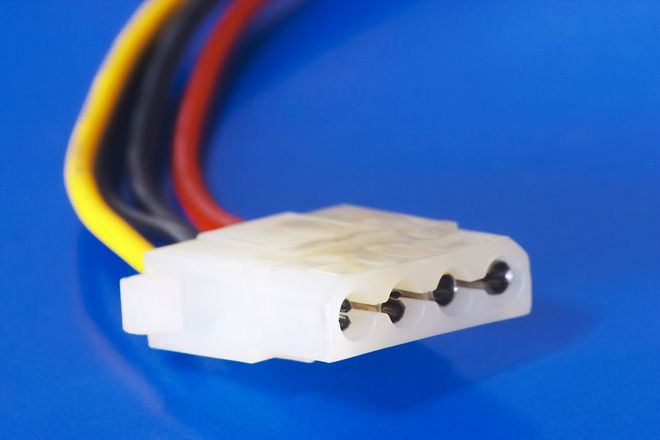 A four-pin Molex power connector on a cable