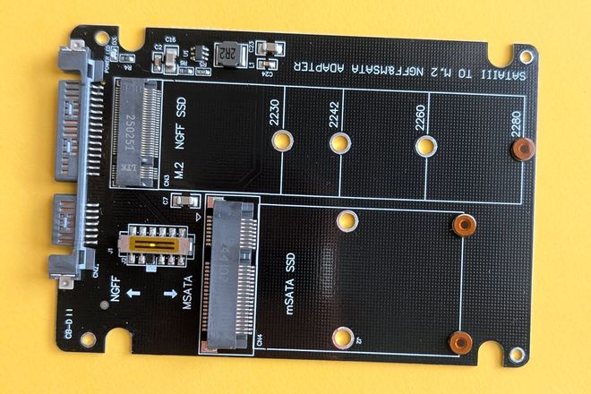 An adapter board with an mSATA slot and an M.2 slot