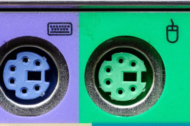 Purple keyboard and green mouse PS/2 ports
