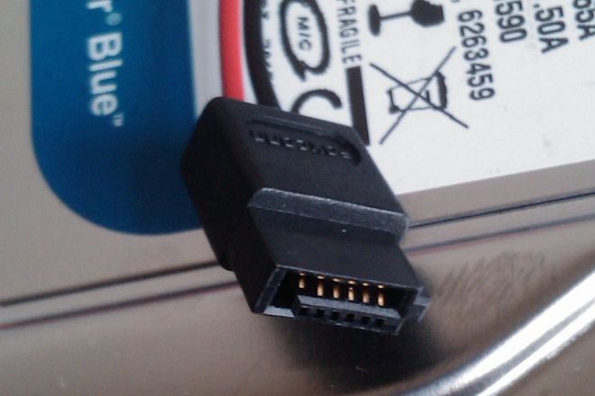 A slimline SATA power connector on a cable