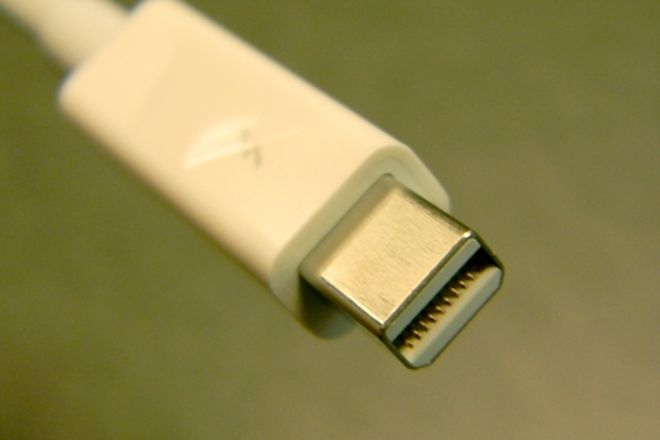 A Thunderbolt plug in the Mini DisplayPort shape, marked with a lightning bolt