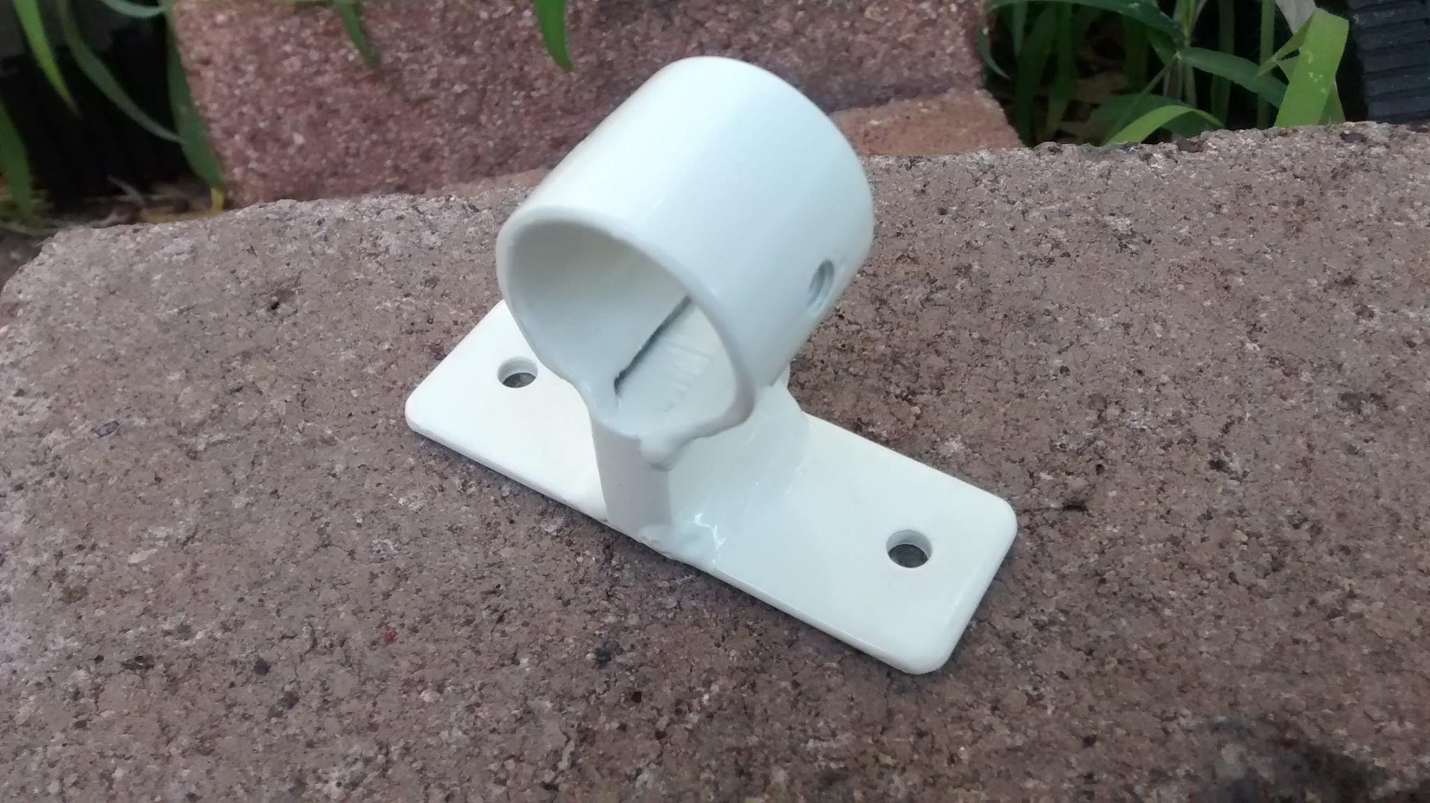 A custom fan holder fabricated for a specific application