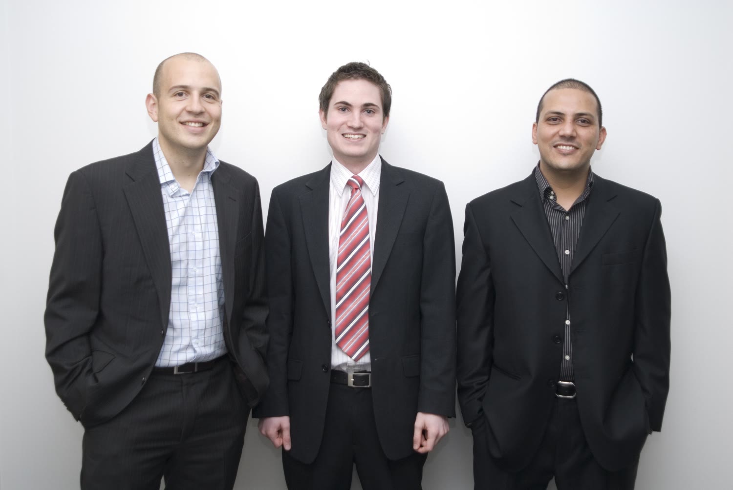 John Walsh-Green with the full 3-person sales team in the company-wide congratulations photo for setting a new company sales record on the mortgage industry magazine