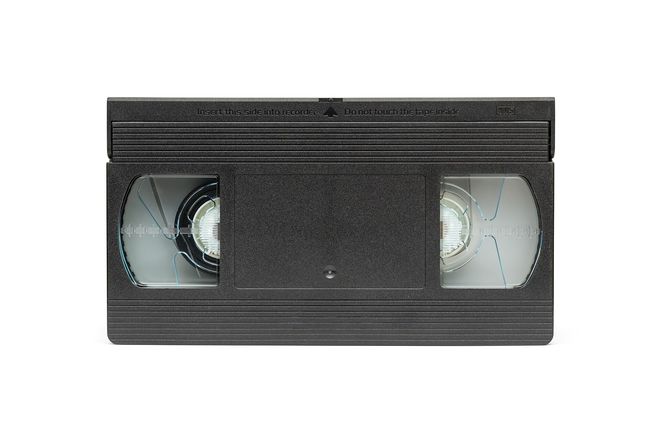 A full-size VHS videocassette seen from the front