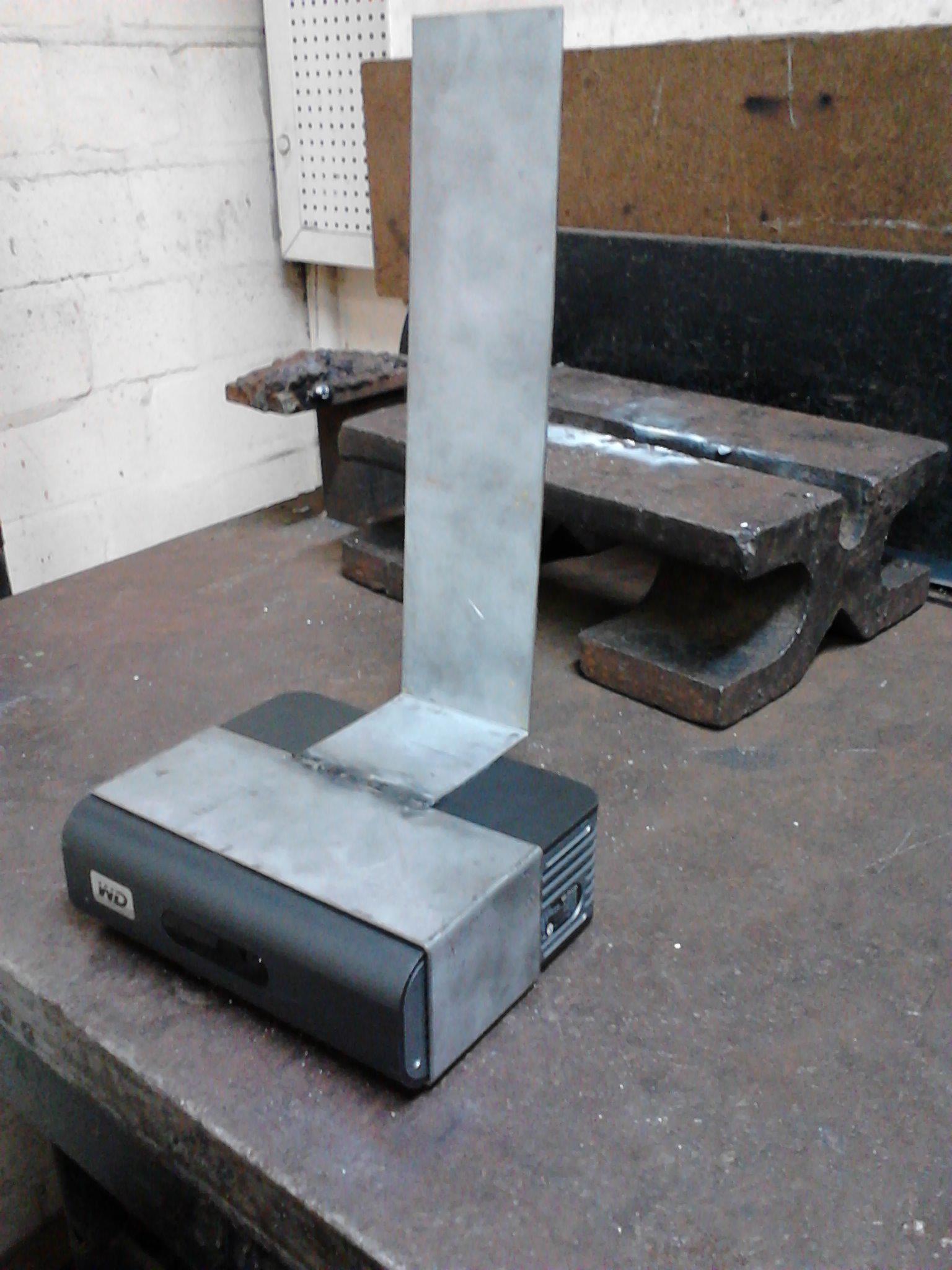 Custom-fabricated TV bracket